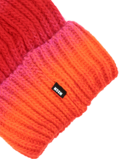 Shop Msgm Knitted Beanie In Red