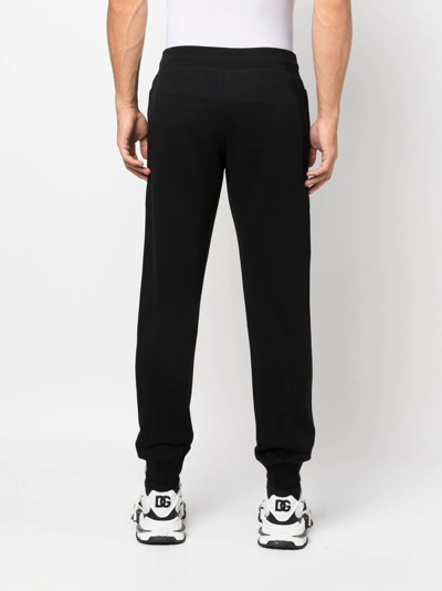 Shop Moschino Logo-print Track Pants In Black