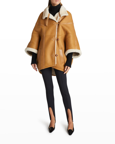 Shop Saint Laurent Oversized Leather Cape With Shearling Lining In Ecru Natur