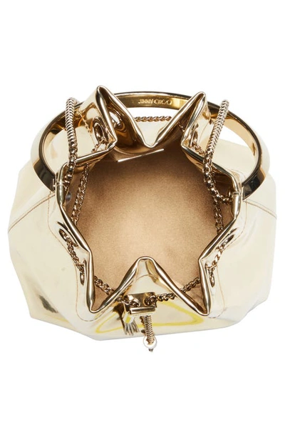 Jimmy Choo Shiny Mirror-effect Bon Bon Bag With Chain Drawstring And Metal Handle In Gold