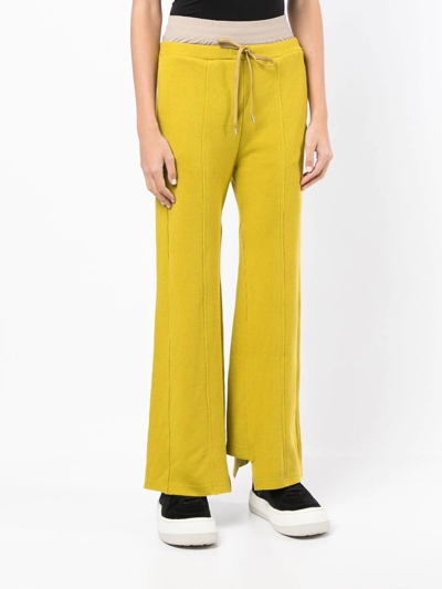 Shop Miharayasuhiro Logo-patch Flared Trousers In Yellow