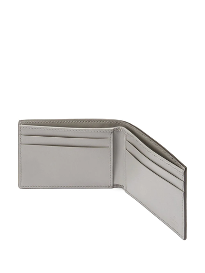 Shop Gucci Gg Embossed Bi-fold Wallet In Grey