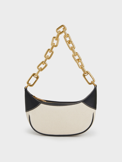 CHARLES & KEITH - Products featured: Madison Caged See-Through Slide  Sandals -  Sonnet Two-Tone Chain Handle  Shoulder Bag -  Shalia Canvas  Chain-Handle Moon Bag 
