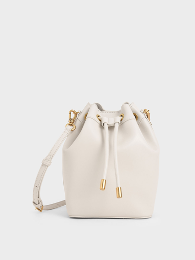 Shop Charles & Keith Drawstring Bucket Bag In Ivory