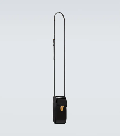 Shop Saint Laurent Tuc Patent Leather Phone Pouch In Black