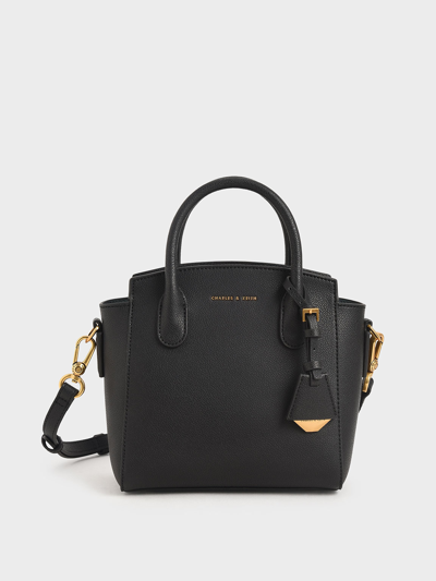 Charles and keith trapeze tote bag sales