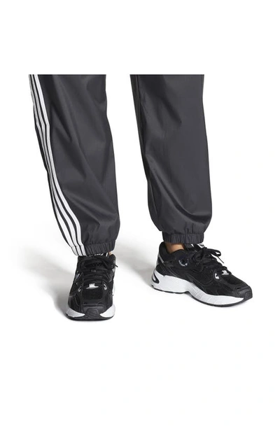 Shop Adidas Originals Astir Sneaker In Black/ Black/ White