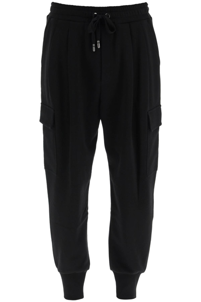 Shop Dolce & Gabbana Fleece Cargo Joggers With Embossed Logo In Black