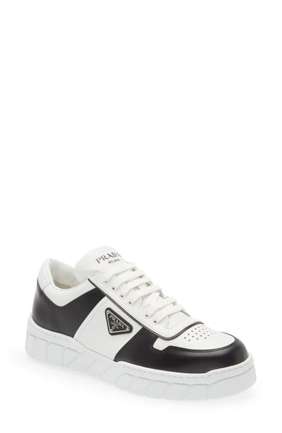 Shop Prada Leather Sneaker In White/ Black