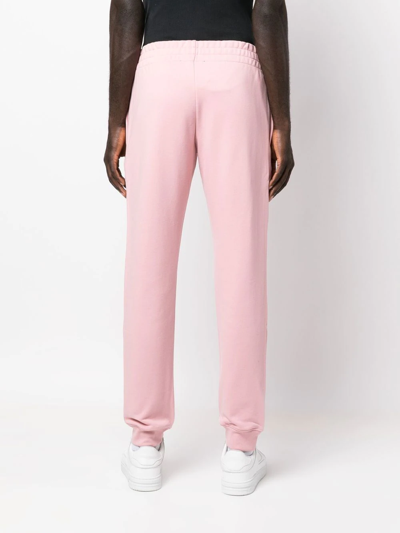 Shop Moschino Logo-print Track Pants In Rosa