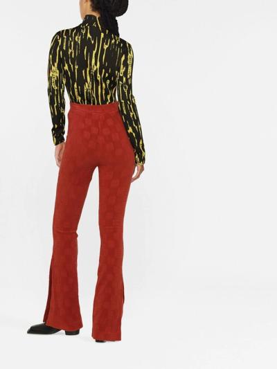 Ambush High-waisted Flared Trousers In Rust Brown Velvet With Monogram Motif In Braun