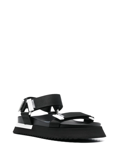 Shop Moschino Touch-strap Sandals In Schwarz