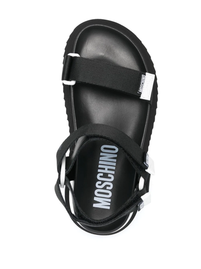 Shop Moschino Touch-strap Sandals In Schwarz