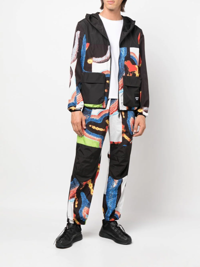 Ambush Abstract-pattern Paneled Track Pants In Schwarz