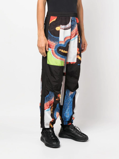 Ambush Abstract-pattern Paneled Track Pants In Schwarz