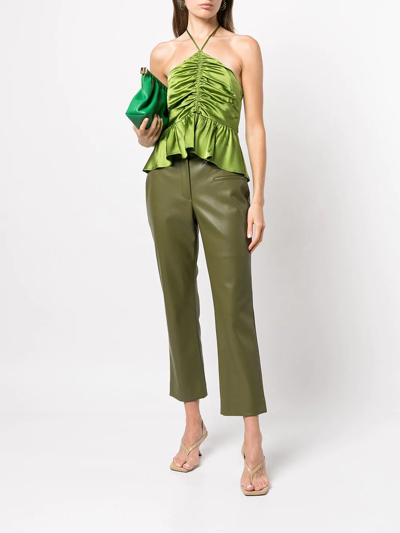 Shop Cinq À Sept Colby Ruched Peplum Top In Green