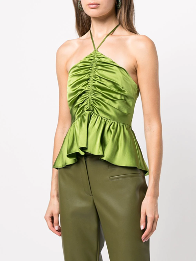 Shop Cinq À Sept Colby Ruched Peplum Top In Green