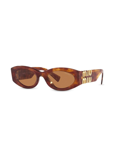 Shop Miu Miu Tortoiseshell Cat-eye Sunglasses In Brown
