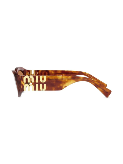 Shop Miu Miu Tortoiseshell Cat-eye Sunglasses In Brown