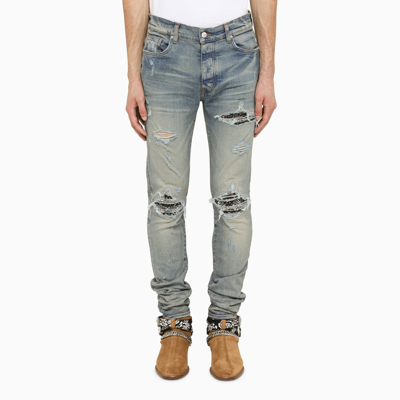 Shop Amiri Light Blue Skinny Jeans With Camouflage Patches