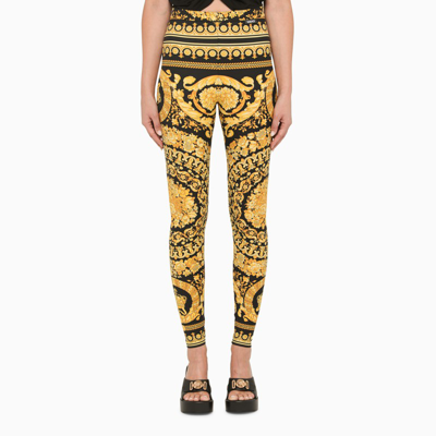 Shop Versace | Black And Gold Leggings With Baroque Print In ["multicolor"/ "print"/ "yellow"]