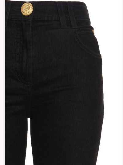 Shop Balmain Logo Button Jeans In Black