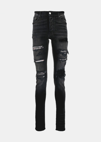 Shop Amiri Aged Black Hibiscus Artpatch Jeans