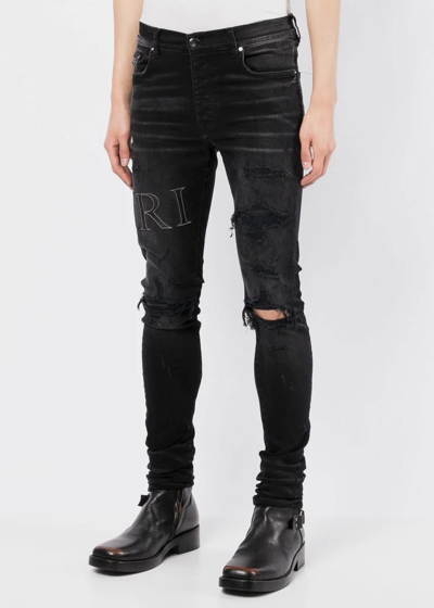 Amiri Aged Black Leather Stitch Logo Jeans | ModeSens