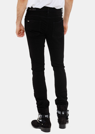 Shop Amiri Black Thrasher Plus Jeans