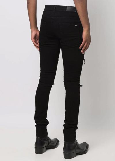 Shop Amiri Black Thrasher Plus Jeans