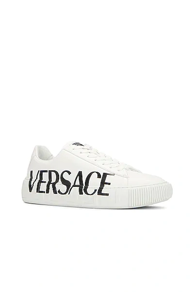 Shop Versace Sneaker In White