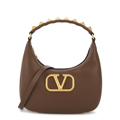 VALENTINO GARAVANI Stud Sign embellished leather shoulder bag in 2023