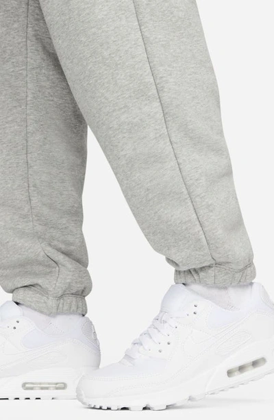 Shop Nike Oversize Fleece Cargo Sweatpants In Dark Grey Heather/ White
