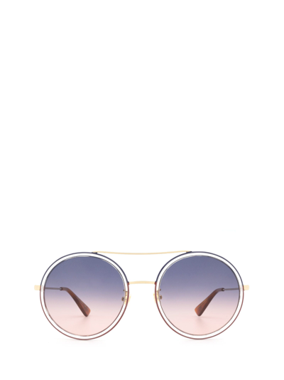 Shop Gucci Eyewear Sunglasses In Gold