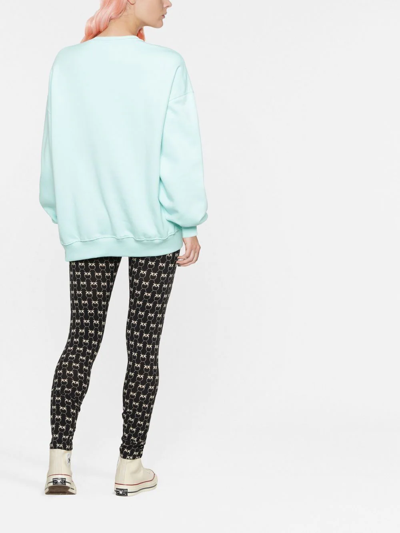 Shop Pinko Logo Pattern Leggings In Schwarz