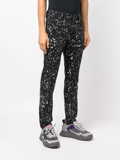 Off-white Man Black Skinny Jeans With Paint Effect Print In Schwarz