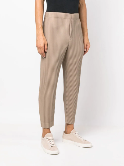 Shop Issey Miyake Mc June Cropped Plissé Trousers In Nude
