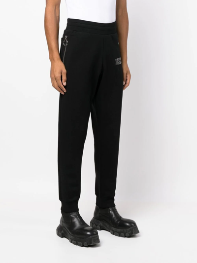 Shop Moschino Slim-cut Track Pants In Schwarz