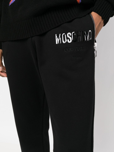 Shop Moschino Slim-cut Track Pants In Schwarz