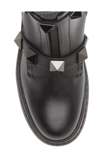 Shop Valentino Roman Stud Lug Combat Boot In 0no Nero