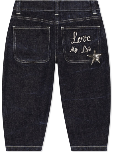 Shop Dolce & Gabbana Sequin-detailing Embroidered-slogan Jeans In Blue