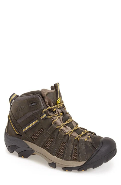 Shop Keen Voyageur Mid Hiking Boot In Raven/ Tawny Olive