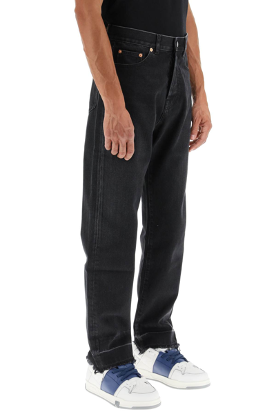 Shop Valentino Straight Jeans With Unstitched Hem In Black