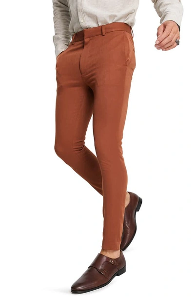 Shop Asos Design Super Skinny Trousers In Auburn