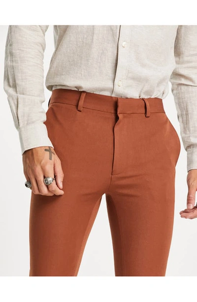 Shop Asos Design Super Skinny Trousers In Auburn