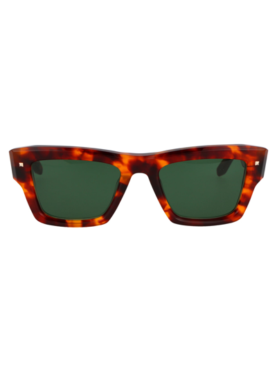 Shop Valentino Xxii Sunglasses In Honey Tortoise W/ Dark Green