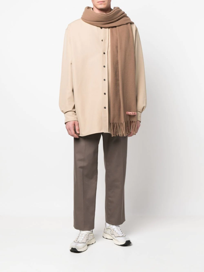 Acne Studios Logo-tag Frayed-edge Scarf In Brown