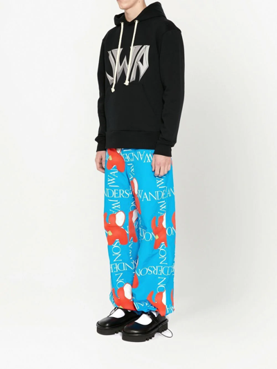 Shop Jw Anderson Logo-print Wide-leg Trousers In Blue