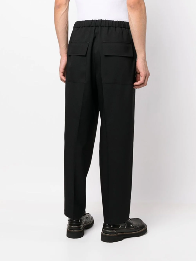 Jil Sander Elasticated-waistband Tapered Trousers In Black