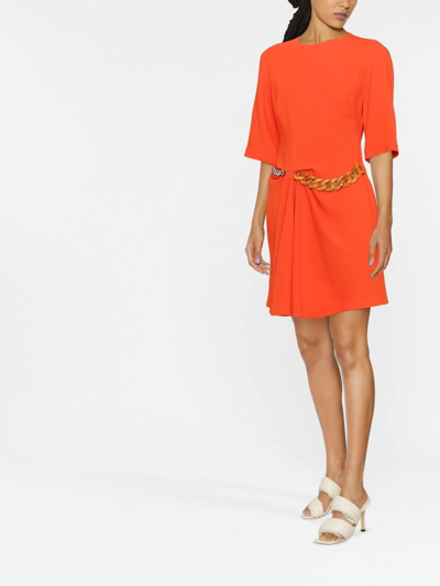 Shop Stella Mccartney Chain-detail Draped Mini Dress In Orange